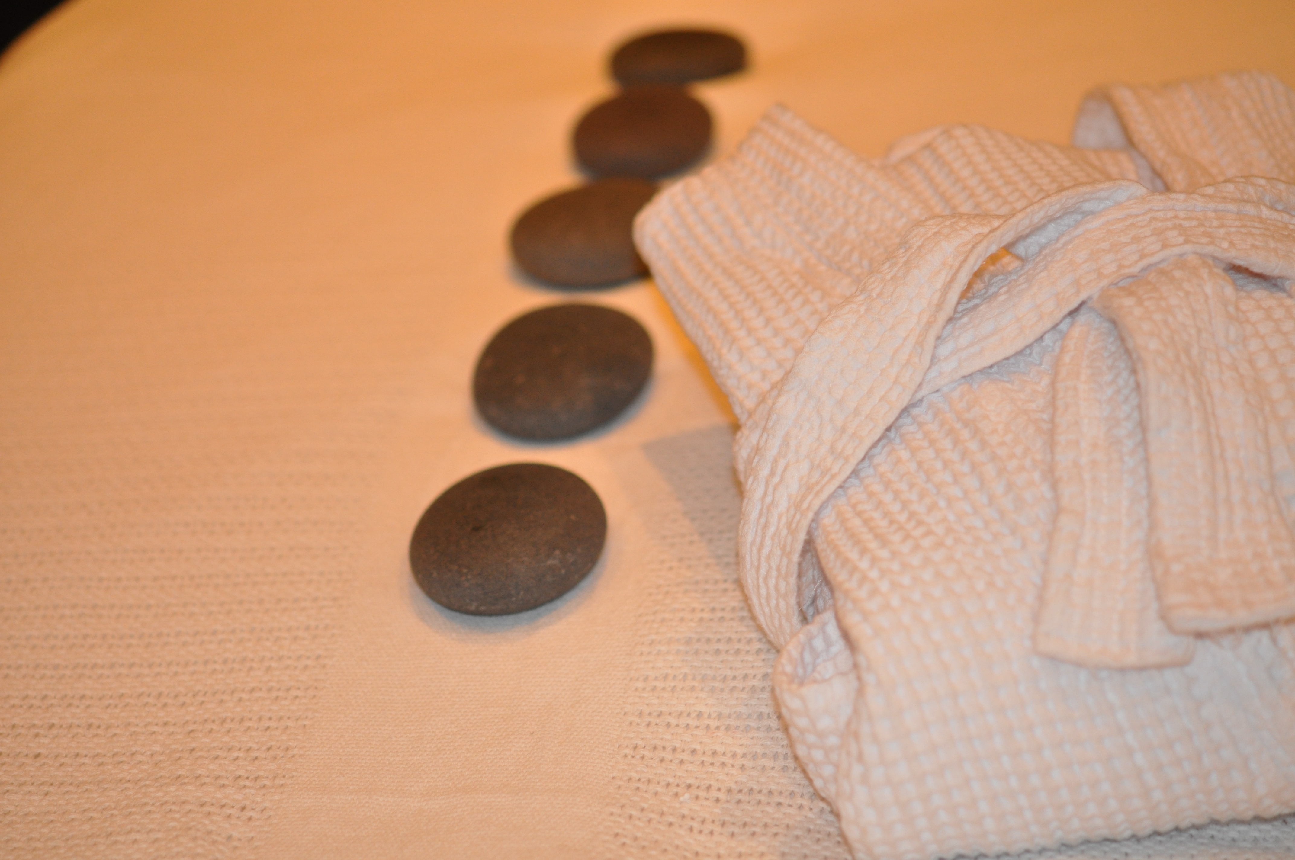 Massage Therapy at DermaSpa Ajax Pickering in Durham Region: Hot Stone Massage